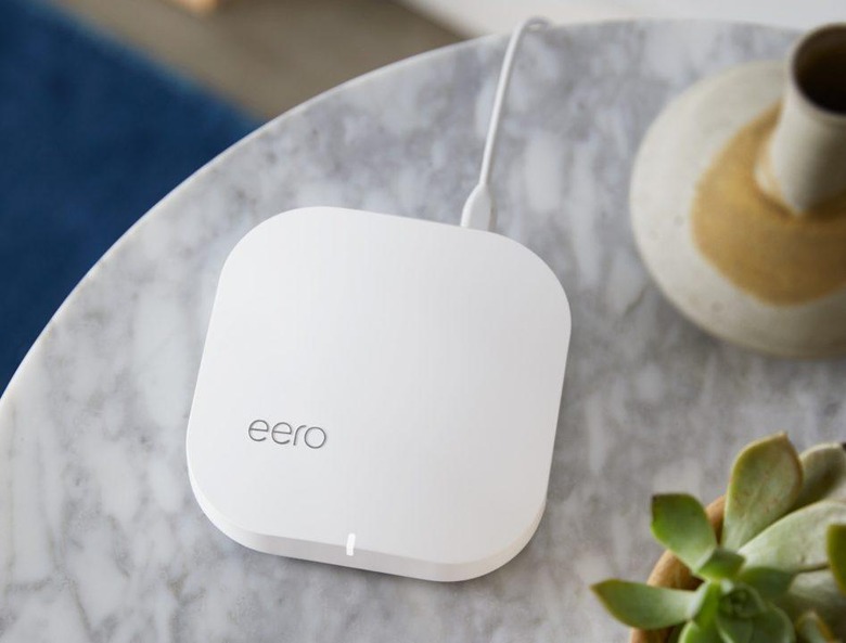 Second-generation eero devices on a table